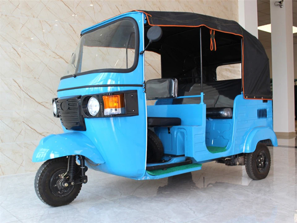 Kolmipyörä matkustajan kanssa